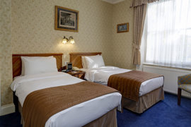 swiss-cottage-hotel-bedrooms-21-83650.jpg