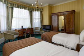 swiss-cottage-hotel-bedrooms-23-83650.jpg