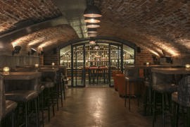vaulted cellar beneath JB parker's complete with wine machine and tasting room