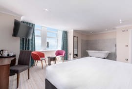 The Junior Suite has a roll-top bath, sea views and modern design